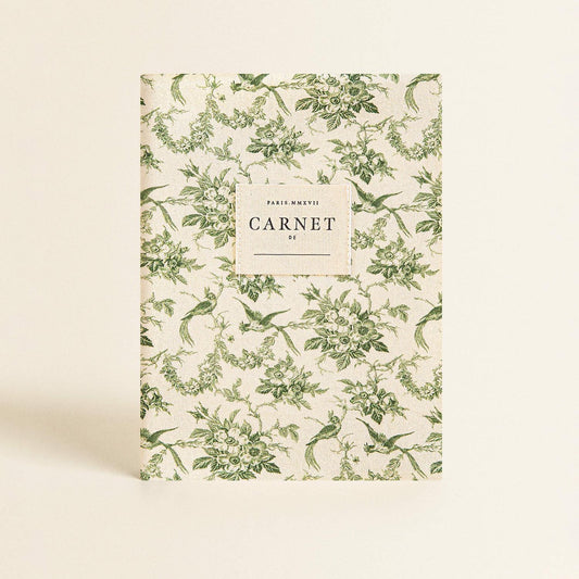 Cuaderno pluma verde